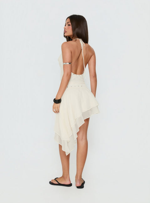 Presenting the Gemmina Asymmetrical Chiffon Mini Skirt in womens-skirts with mini length back view of model wearing