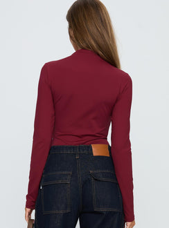 back view of model wearing Princess Polly Augustness Long Sleeve Bodysuit Burgundy Long Sleeve Tops Bodysuit 