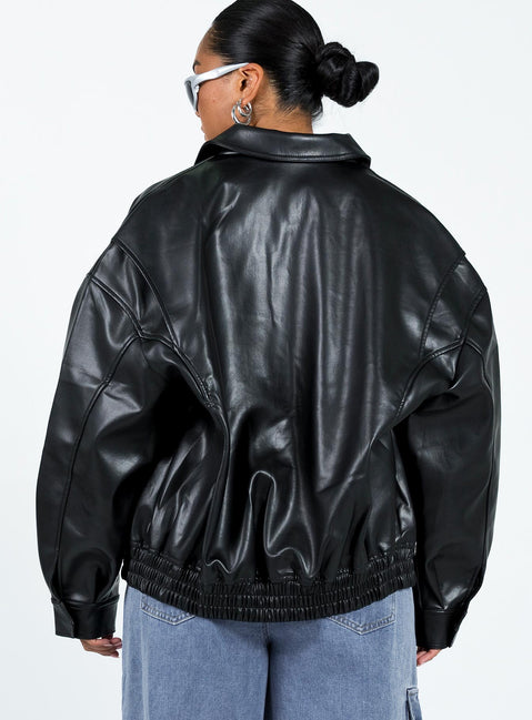 Black bomber jacket Faux leather material Pointed collar Twin hip pockets Elasticated waistband  Single button cuff