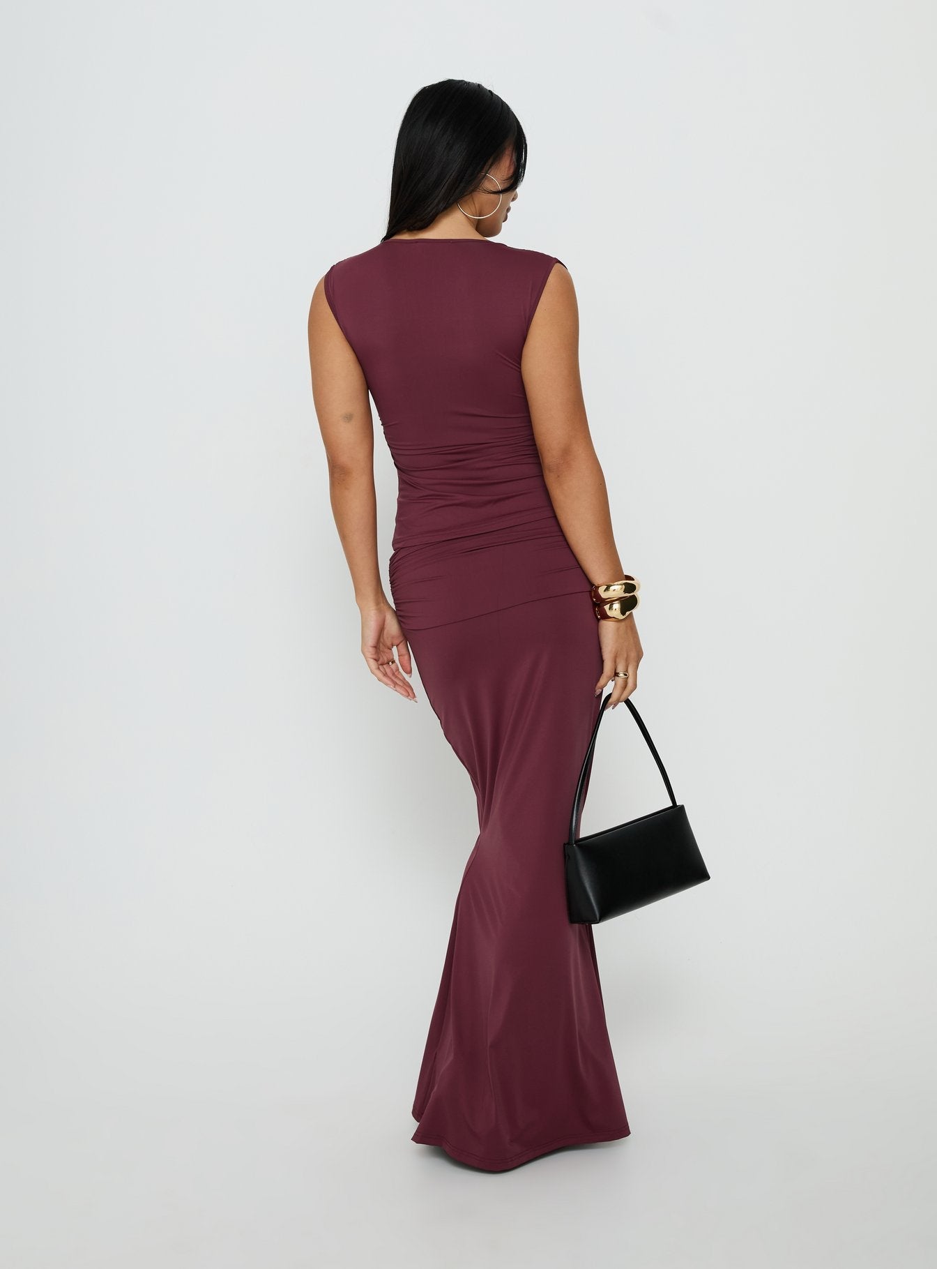 Presenting the Liorah Foldover Waist Maxi Skirt Red in womens-skirts with a maxi length back view of model wearing Princess Polly