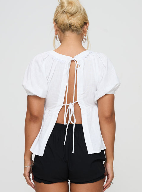back view of model wearing Princess Polly Weyes Smock Top White Short Sleeves Scoop Neck 