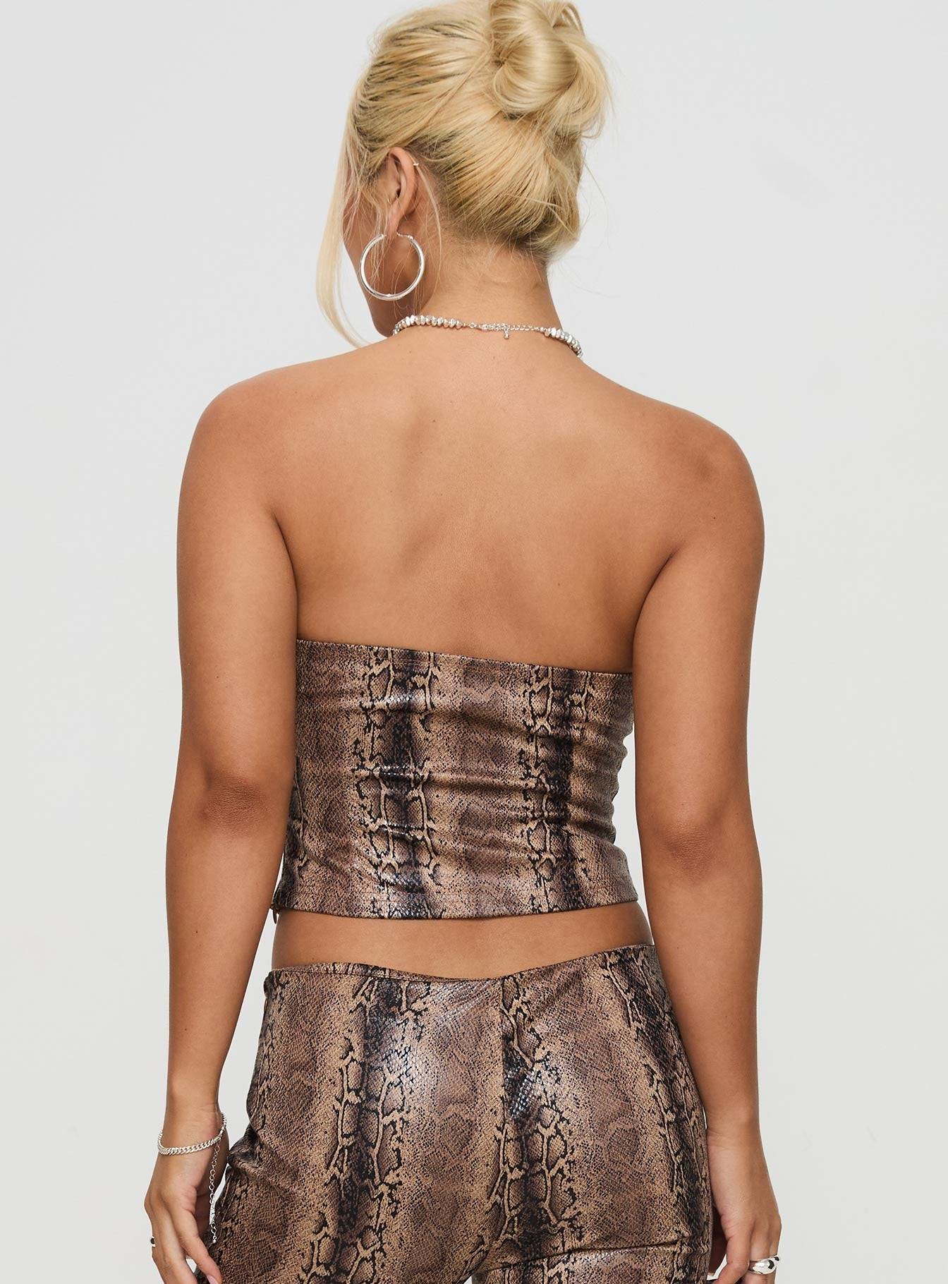 back view of model wearing Princess Polly Kinniya Strapless Top Brown Multi Sleeveless straight 