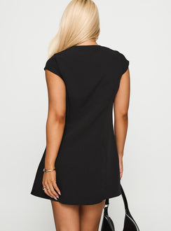 back view of model wearing Princess Polly Adeleine Bow Mini Dress Black Crew Neck 