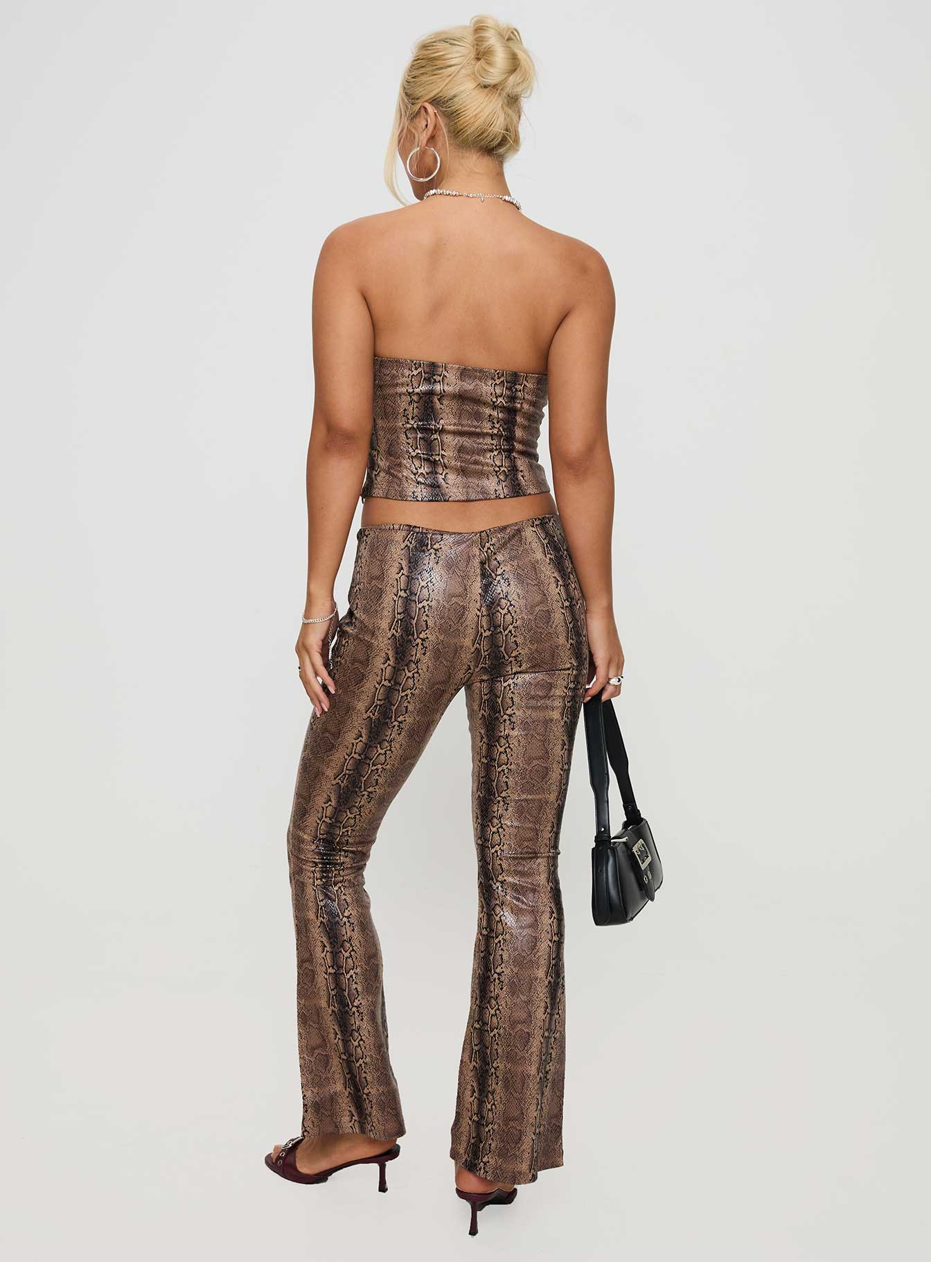 back view of model wearing Princess Polly Slither Pants Snake Print Low Rise Pants 