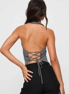 back view of model wearing Princess Polly Anatolius Top Pinstripe Grey Sleeveless V-Neck 