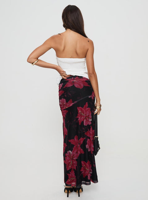 back view of model wearing Princess Polly Cooperi Maxi Skirt Black / Red Floral Maxi 