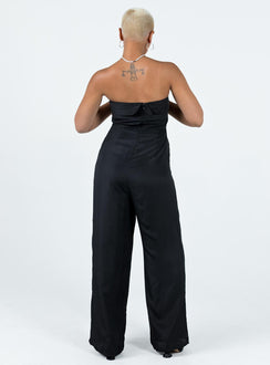 Strapless jumpsuit Folded neckline Inner silicone strip at bust Invisible zip fastening at back