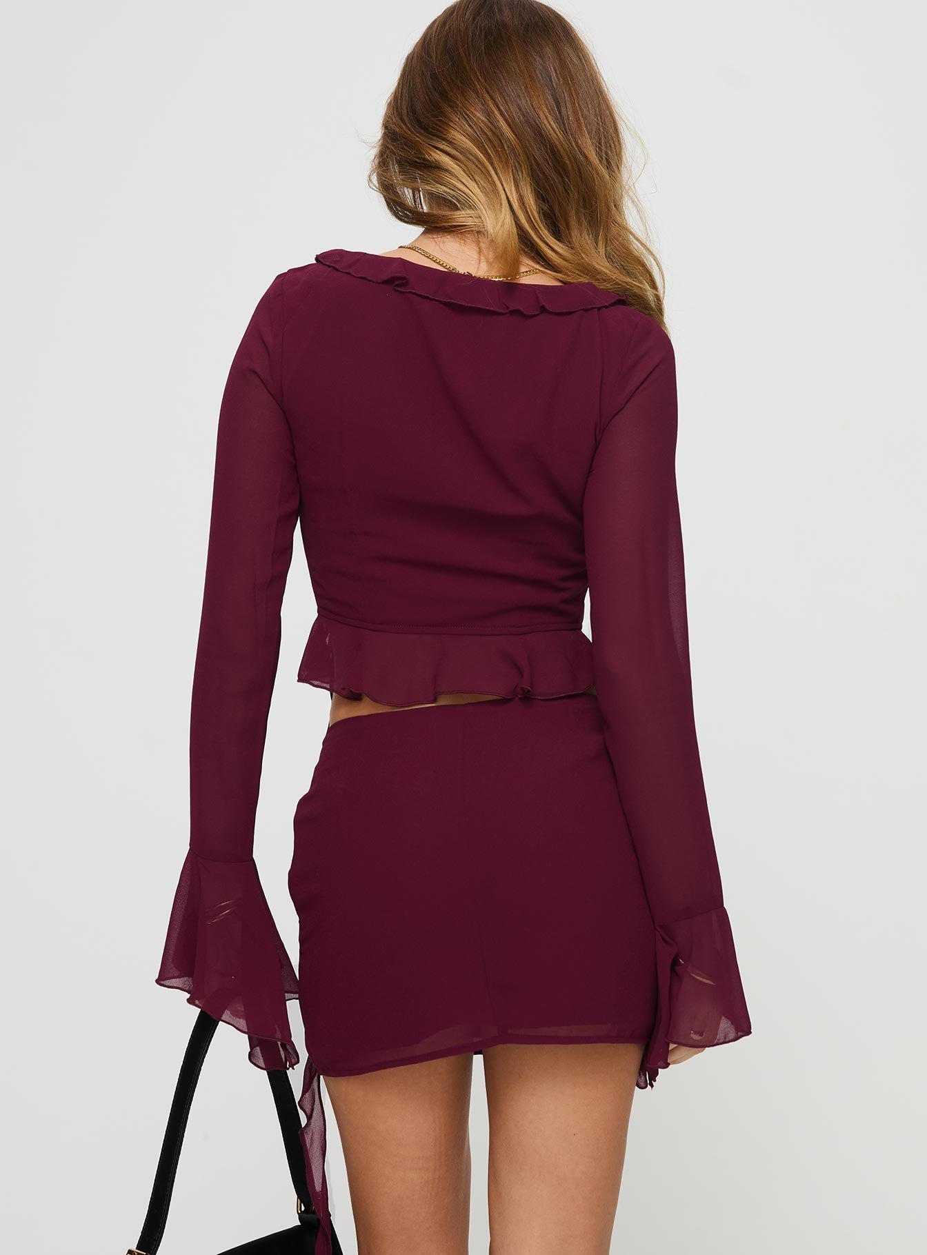 Matching two-piece set Long sleeve style, v-neckline, frill detail, tie fastening, split hem Mini skirt, frill detail, invisible zip fastening Non-stretch material, fully lined  Princess Polly Lower Impact 