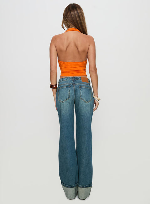 back view of model wearing Princess Polly Toros Mid Rise Wide Leg Foldover Denim Jeans Mid Blue Low Rise Jeans 