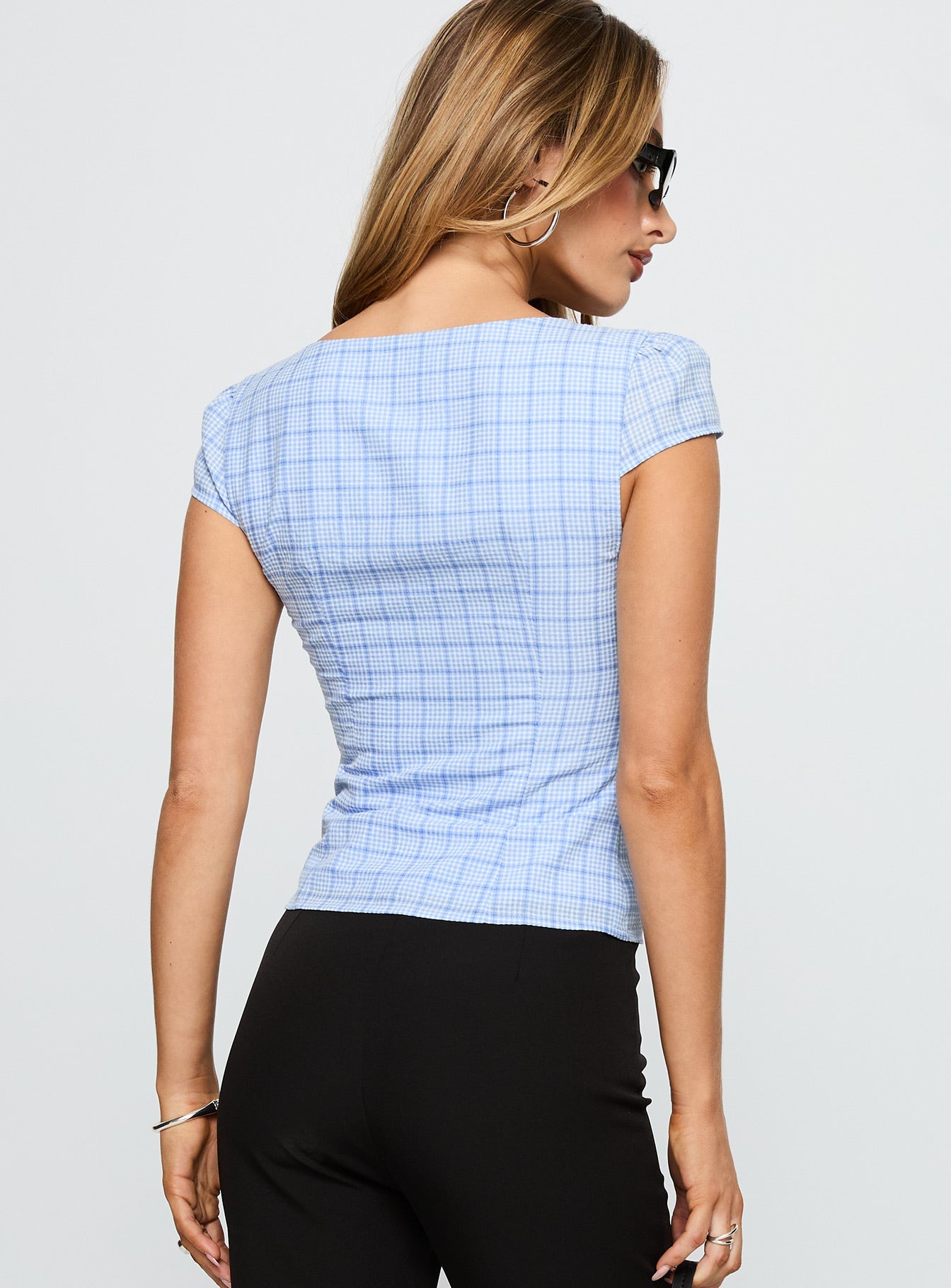 back view of model wearing Princess Polly Getting Close Button Up Top Blue Check Short Sleeves Sweetheart 