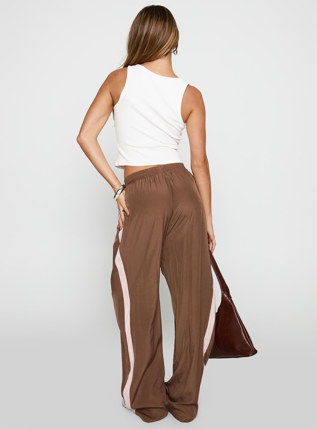 back view of model wearing Princess Polly No Doubts Track Pant Brown High Waisted Pants 
