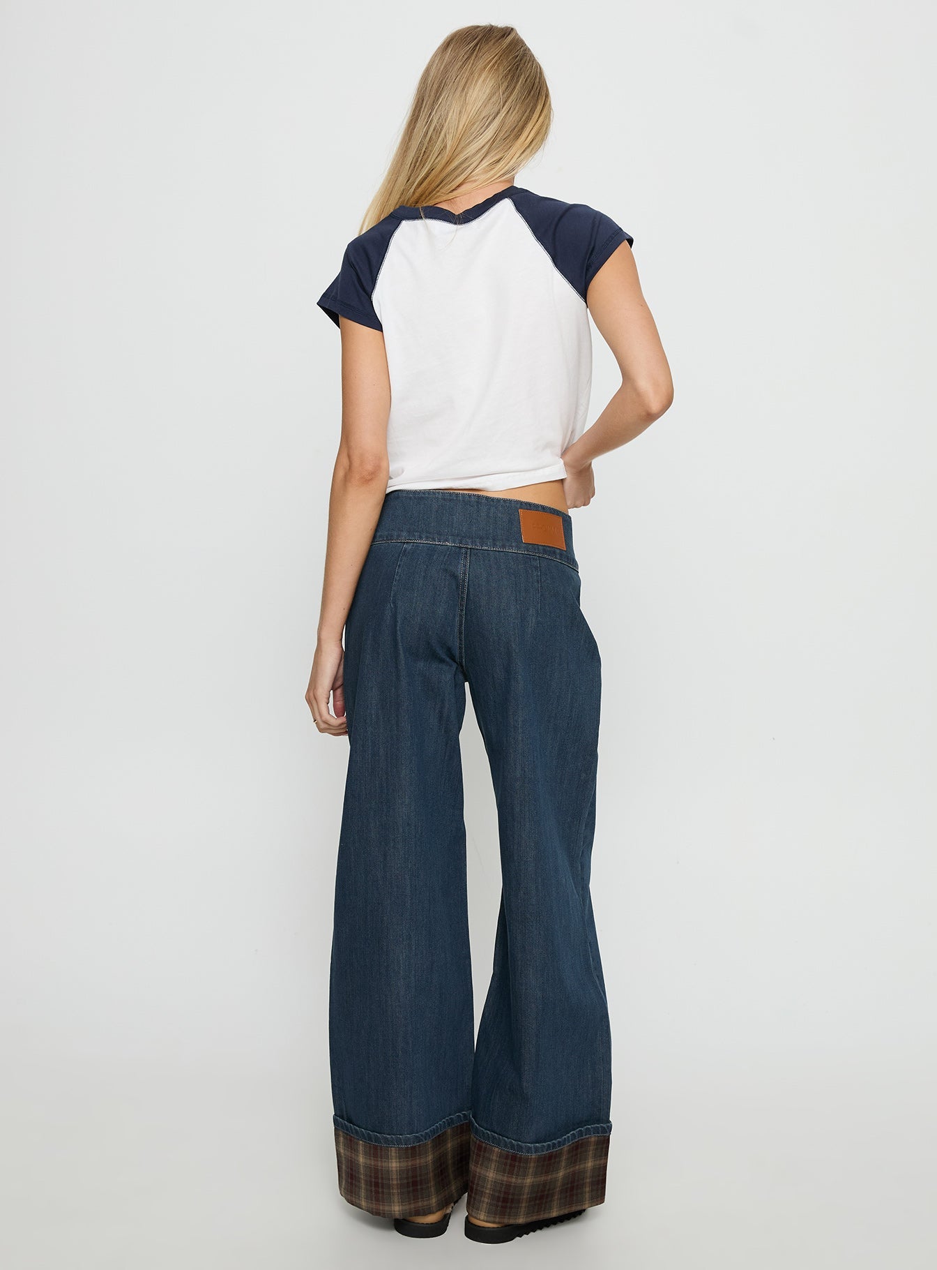 back view of model wearing Princess Polly Nikoletta Foldover Jeans Dark Wash / Check Mid Rise Jeans 