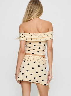 back view of model wearing Princess Polly Porzia Wrap Detail Mini Skirt Cream / Polka Dot Mini Skirts 
