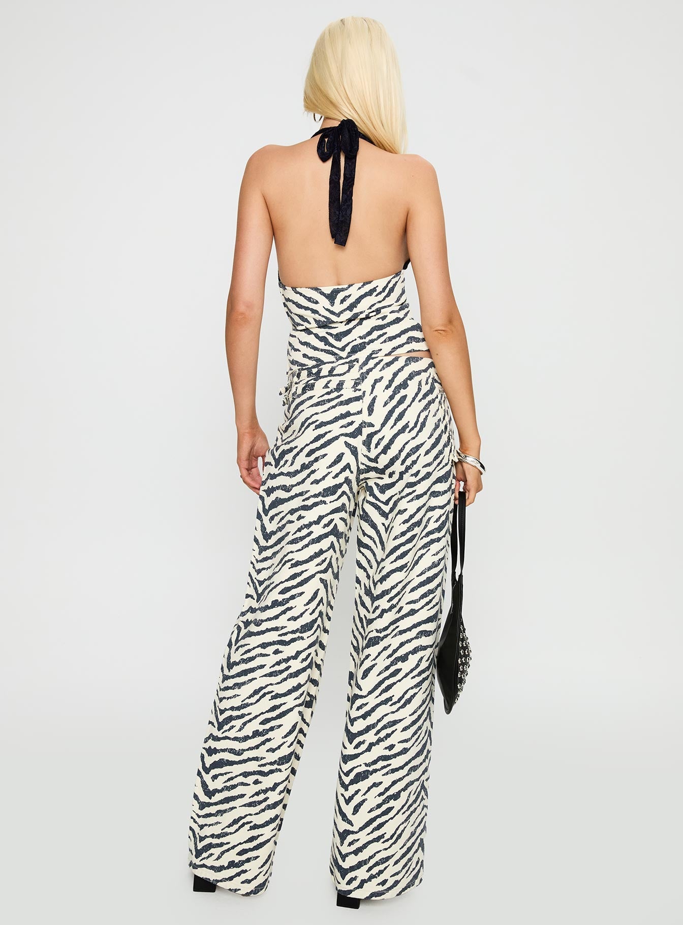 back view of model wearing Princess Polly Paltrow Cargo Pant Zebra High Waisted 