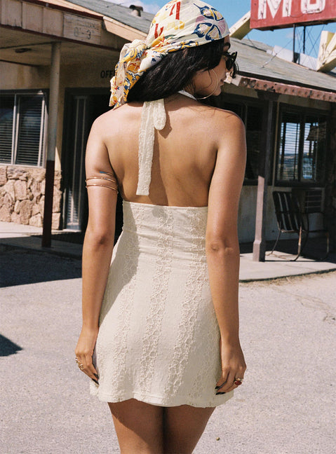 back view of model wearing Princess Polly Youthful Spirit Halter Mini Dress Cream Plunger 