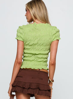back view of model wearing Princess Polly Romelle Shirred Top Lime Short Sleeves High Neck 