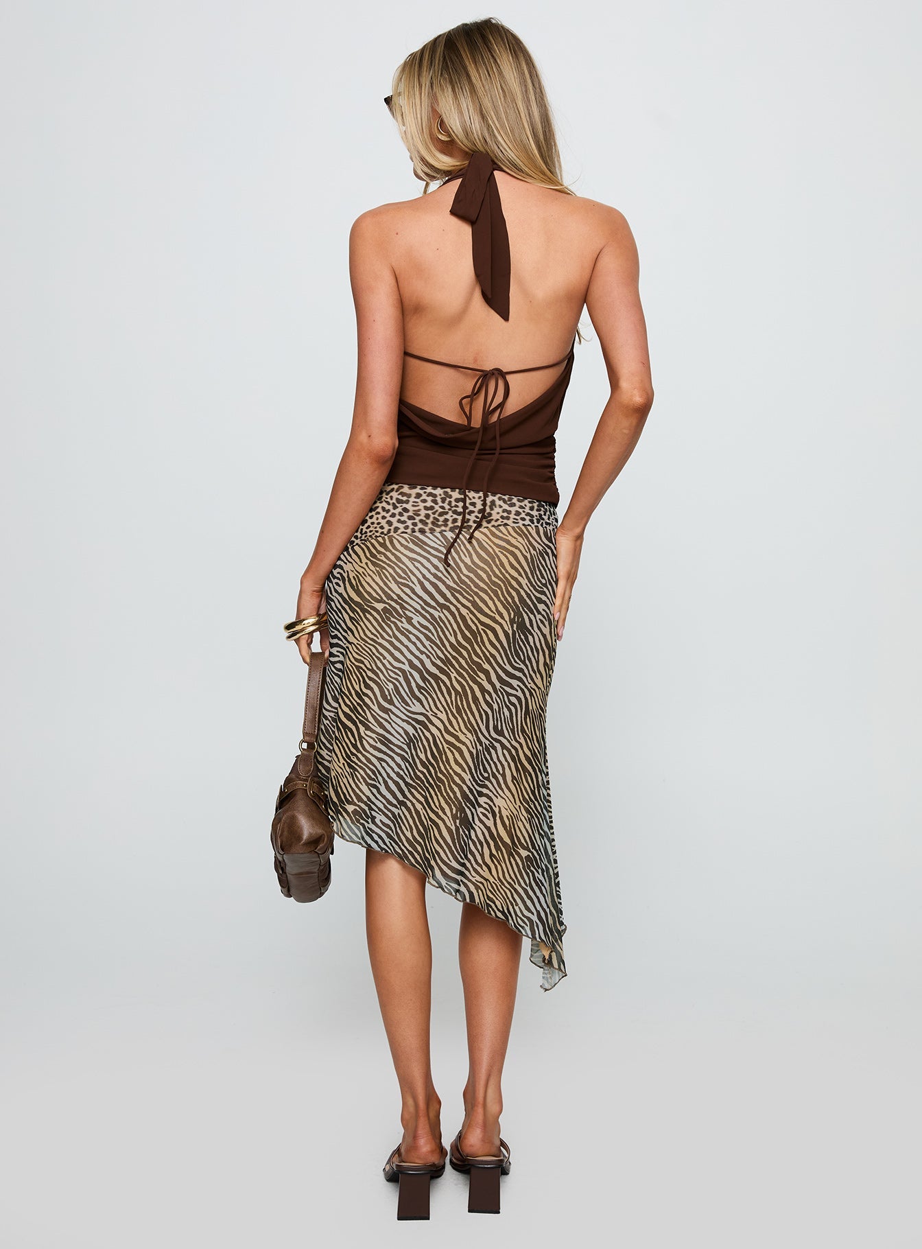 back view of model wearing Princess Polly Diora Asymmetrical Midi Skirt Animal Print Midi Skirts 