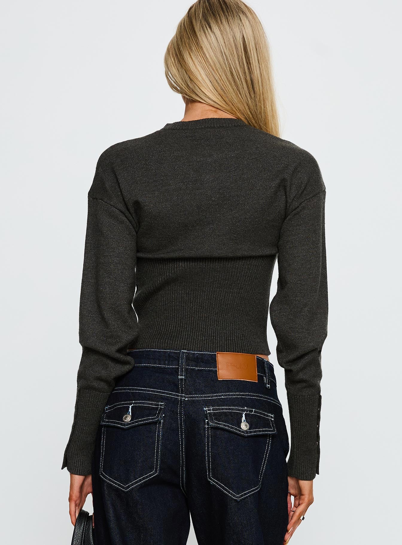 back view of model wearing Princess Polly Head In The Clouds Knit Cardigan Grey Argyle cropped 