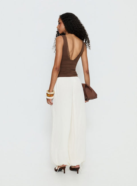 back view of model wearing Princess Polly Moondancer Balloon Pants Cream Mid Rise Pants 