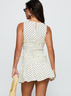 back view of model wearing Princess Polly Tovie Frill Linen Blend Skort Cream Polka Low Rise Shorts 