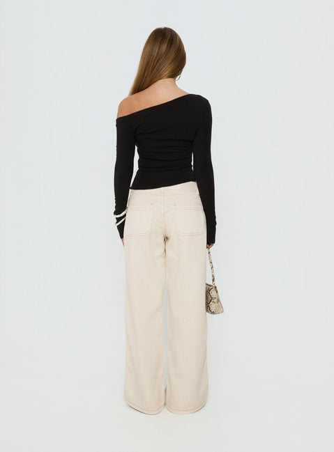 back view of model wearing Princess Polly Lifetimes Mid Rise Wide Leg Cargo Jeans Cream Mid Rise Jeans Jeans 