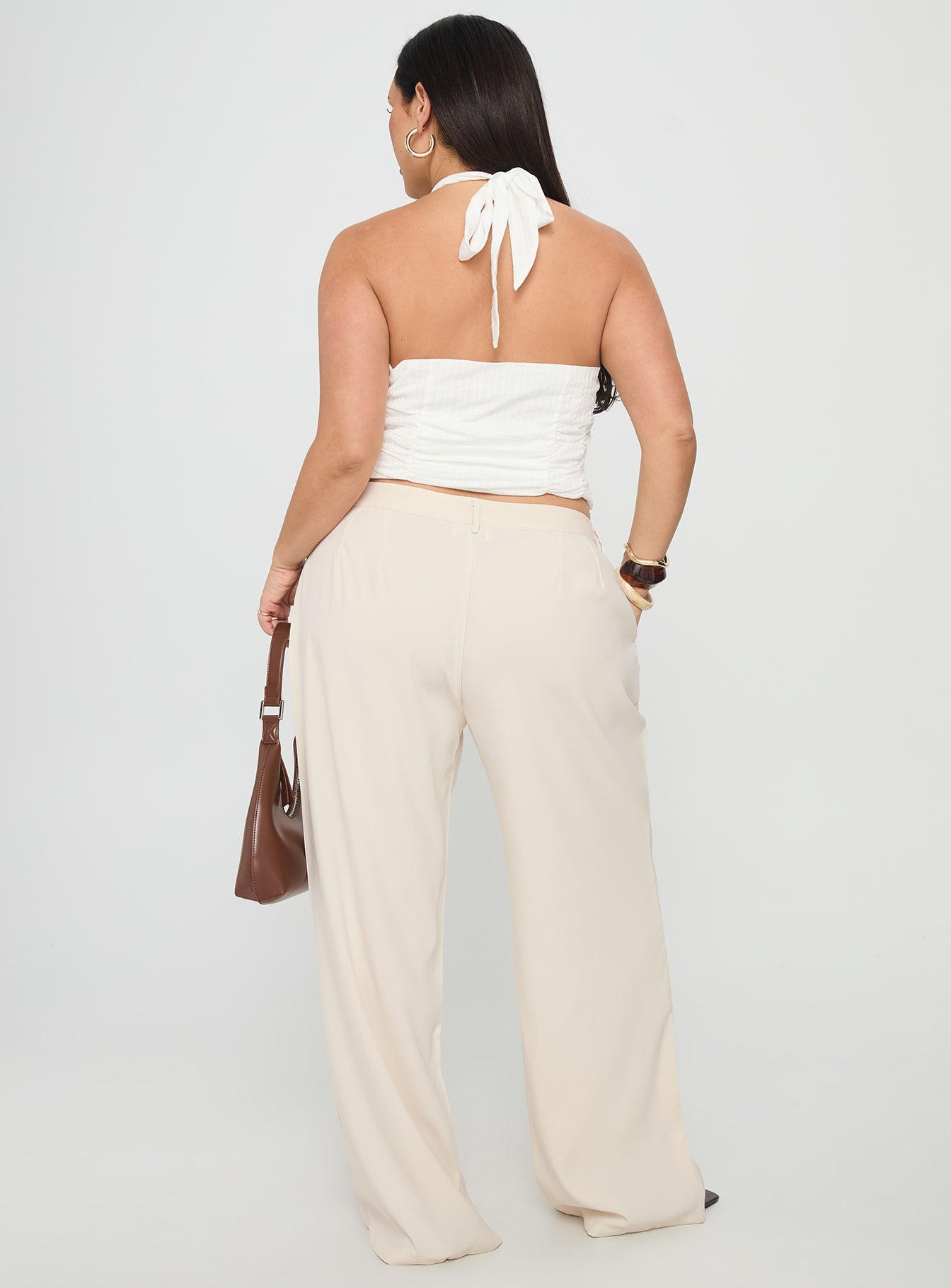 back view of model wearing Princess Polly Irresistible Wide Leg Pant Cream Curve High Waisted Pants 