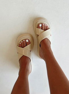 Flats Faux leather material  Cross strap upper  Platform base 