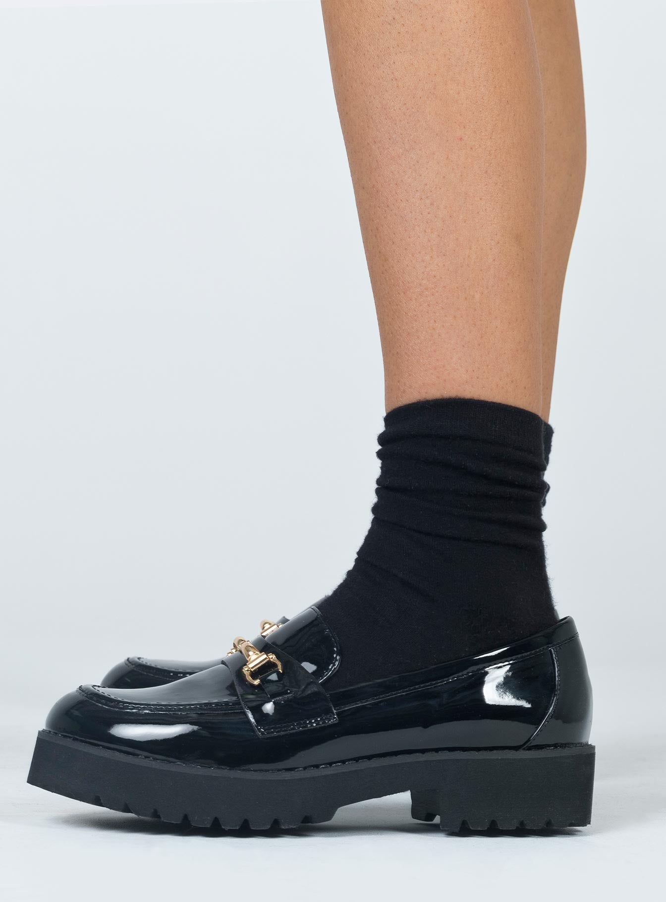 Loafers Man-made upper, lining & sole Faux patent leather Gold-toned snaffle detail Platform base  Treaded sole 