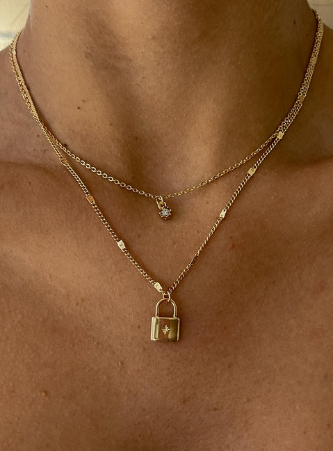 Gold Necklace Pack of two  Fixed design - these can not be wrong separately  Dainty gold-toned chain  Padlock pendant  Lobster clasp fastening 