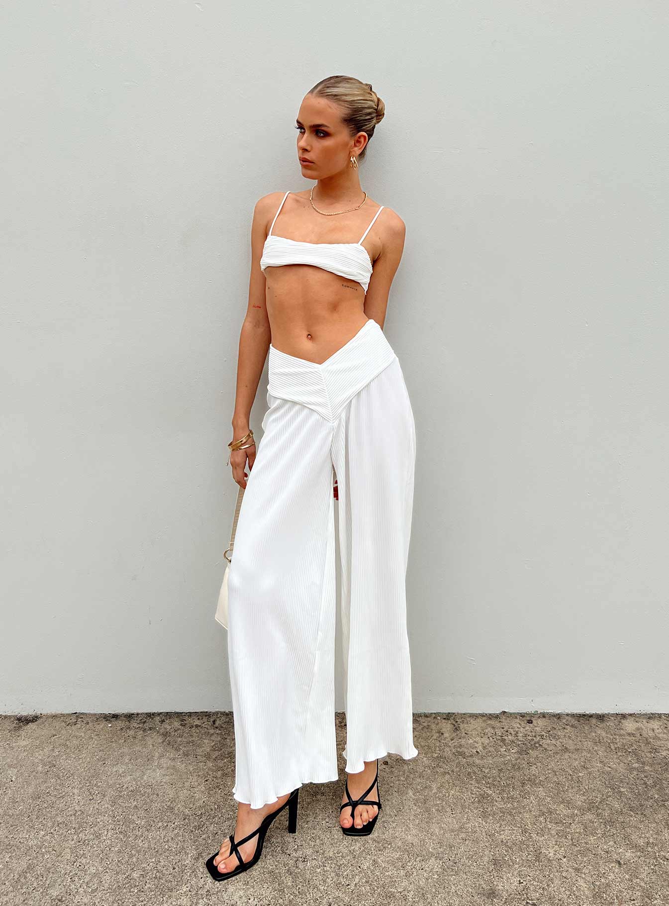 Front view of model wearing  front Princess Polly Sleeveless Asymmetric Neckline  Mathea Plisse Bralette Ivory