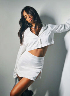 Matching set Silky material Long sleeve crop top Lapel collar V-neckline Button fastening at front Mini skirt Invisible zip fastening at side Slit at front