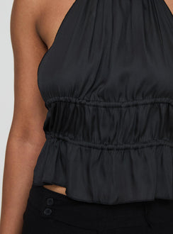 back view of model wearing Princess Polly Legacy Halter Top Onyx Sleeveless High Neck 