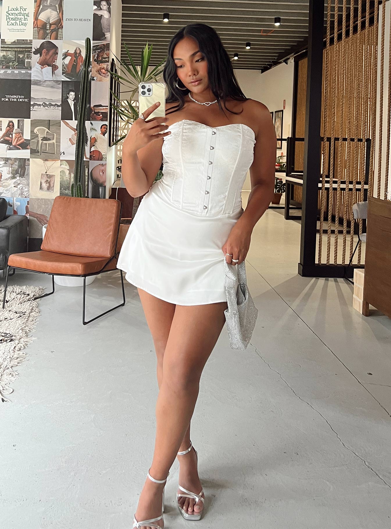 Front view of model wearing  front Princess Polly High Neck  Alter Ego Mini Dress White