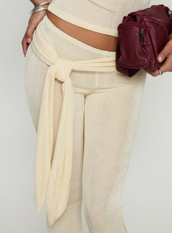 back view of model wearing Princess Polly Butterfly Tie Detail Pants Lemontini Mid Rise Pants 