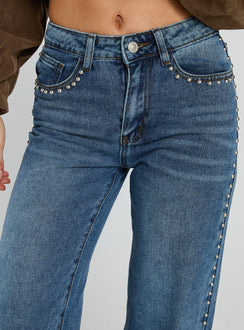 back view of model wearing Princess Polly Saving Up Stud Detail Jeans Mid Blue Mid Rise 