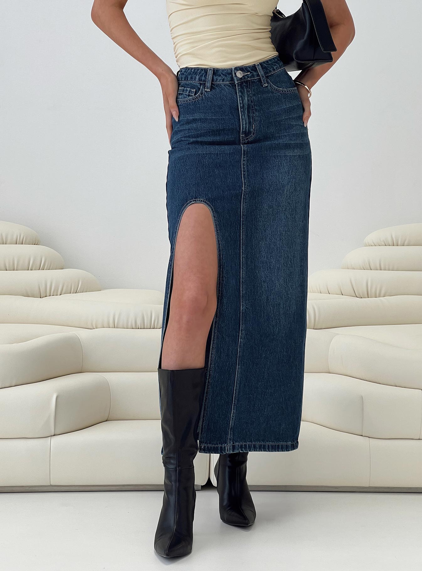 Front view of model wearing  front Saige Denim Maxi Skirt Mid Wash Princess Polly  Midi Skirts 