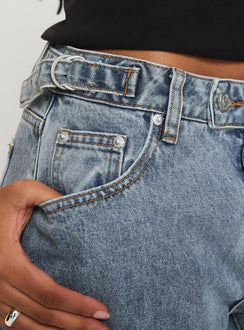 back view of model wearing Princess Polly Sidle Low Rise Jeans Light Wash Low Rise Jeans 