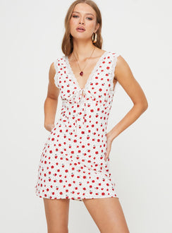 Floral mini dress Fixed wide shoulder straps, tie detail at bust, lace trim, invisible zip fastening at side Non-stretch material, fully lined