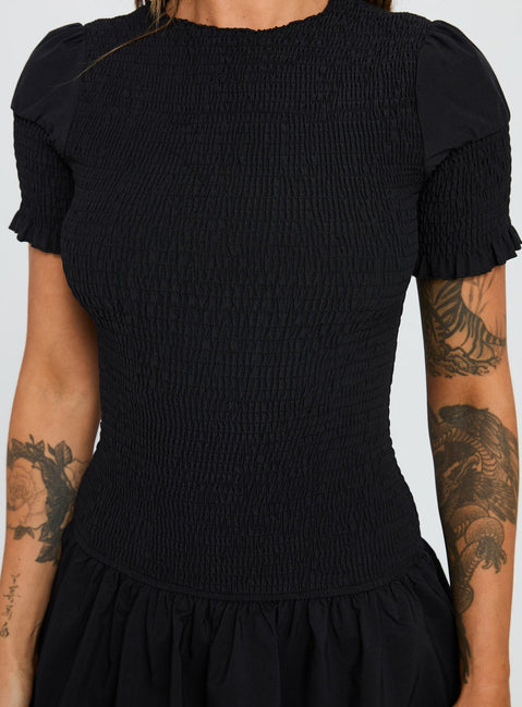 back view of model wearing Princess Polly Laurita Shirred Mini Dress Black High Neck 