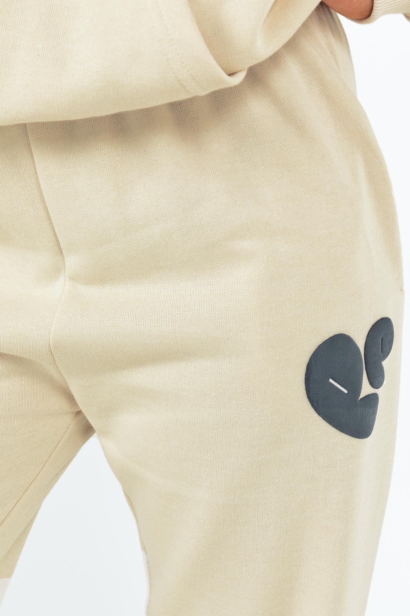 Pants Elasticated waist and cuffs Twin hip pockets Straight leg