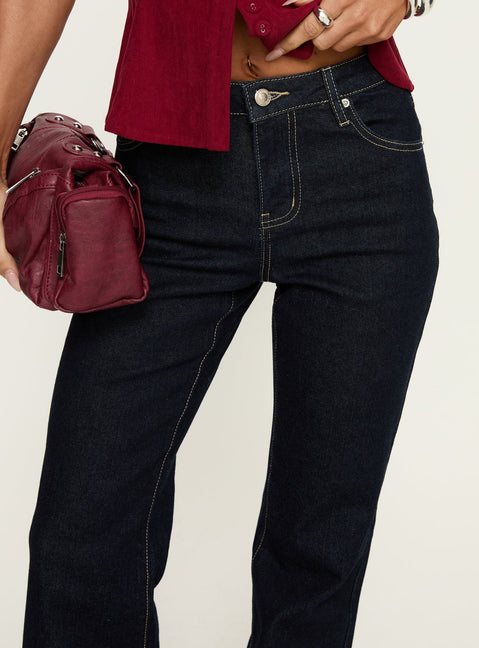 side view of model wearing Princess Polly Magic Mirror Mid Rise Bootleg Jeans Raw Indigo Mid Rise Jeans Jeans 