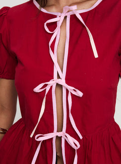 back view of model wearing Princess Polly Ryota Blouse Red/pink Short Sleeves Crew Neck 