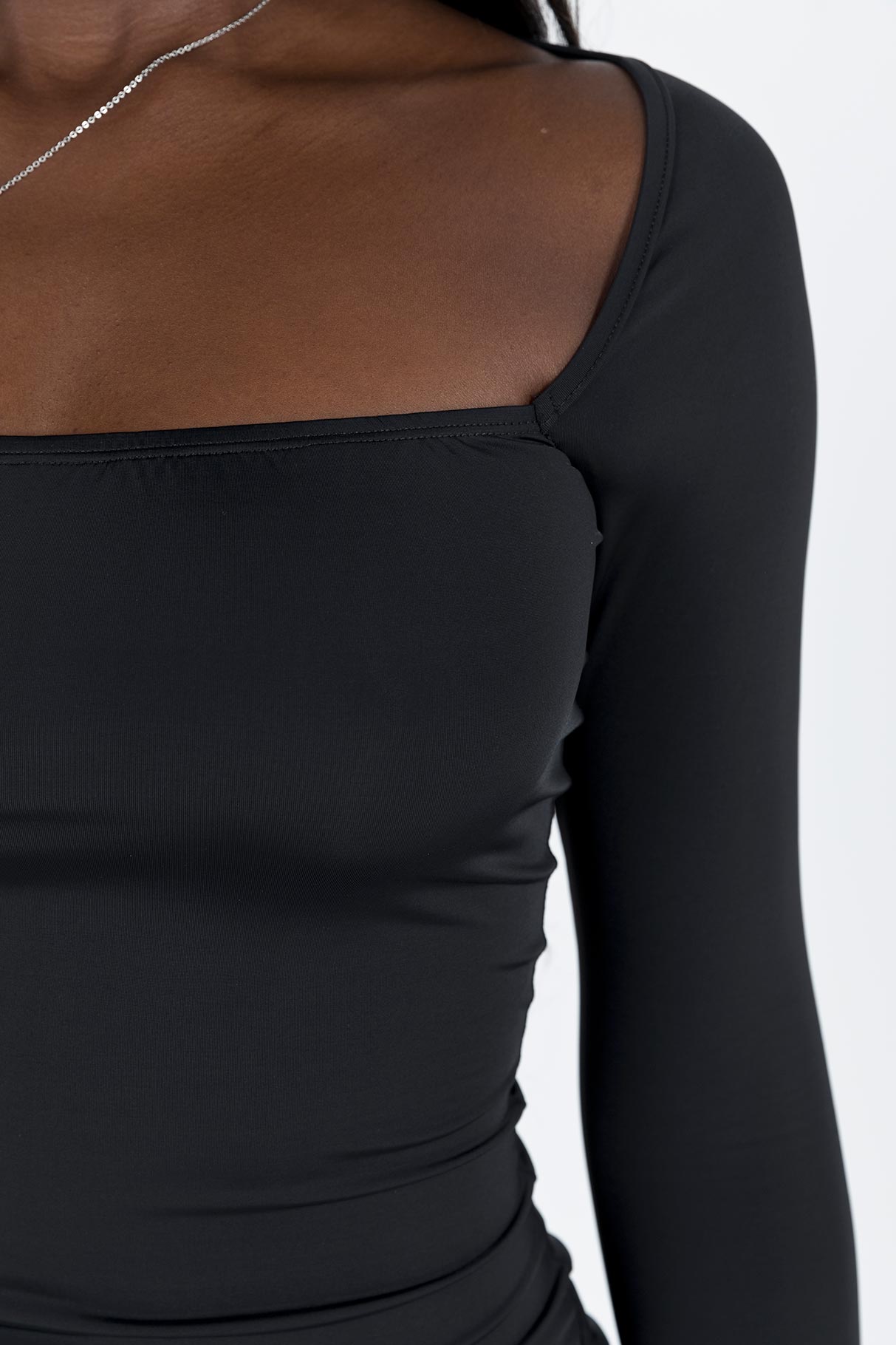 side view of model wearing Princess Polly Hayward Long Sleeve Midi Dress Black Square Neck 