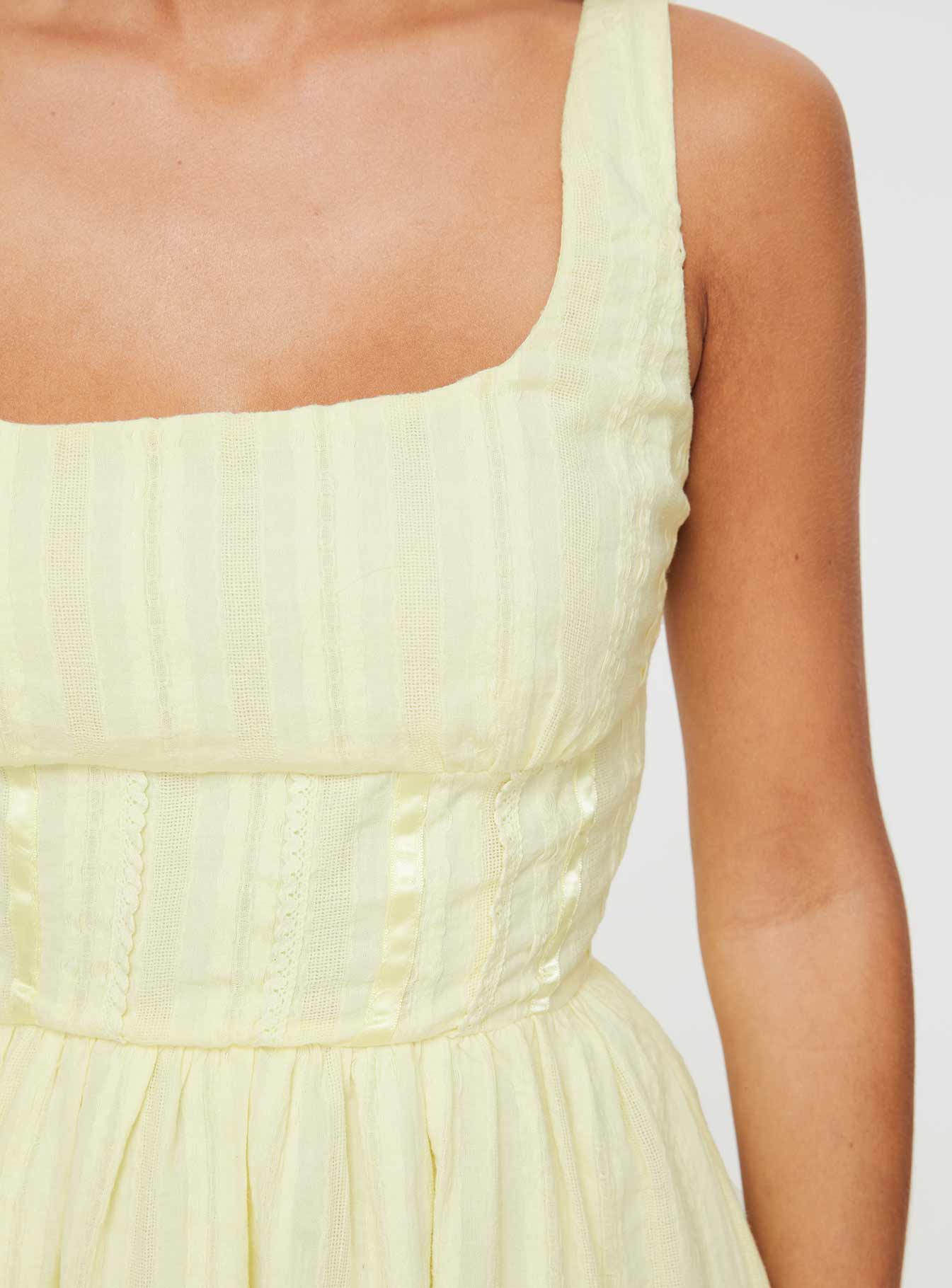 Front view of model wearing  front Princess Polly Square Neck  Lorinda Mini Dress Yellow