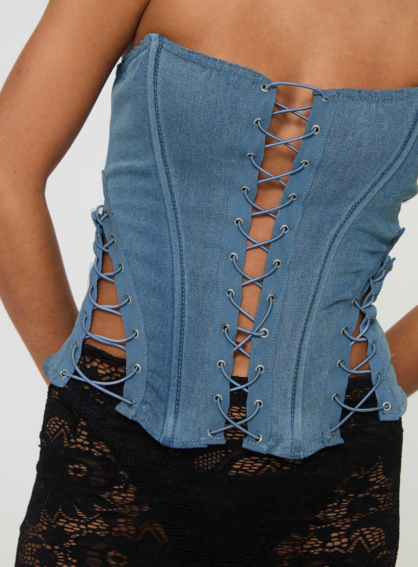 back view of model wearing Princess Polly Eden Lace Up Corset Denim Mid Wash Sleeveless straight 