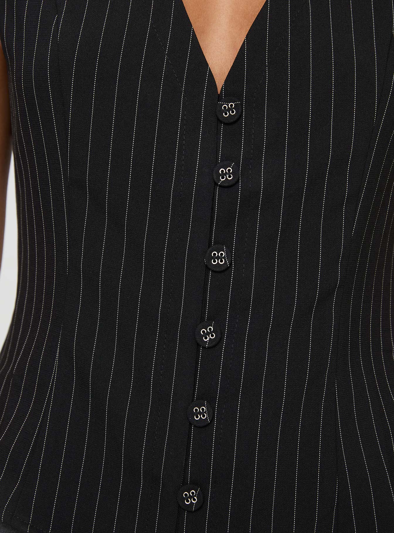 Top Vest style, pinstripe print, button fastening