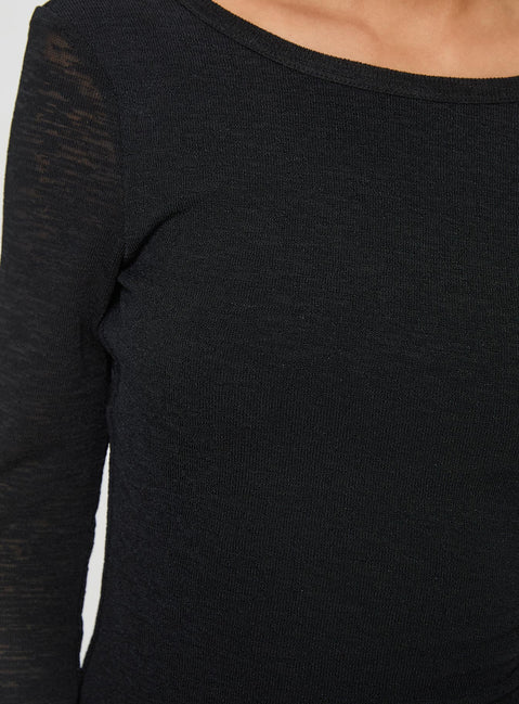 Black long sleeve mini dress High neckline, low scooped back