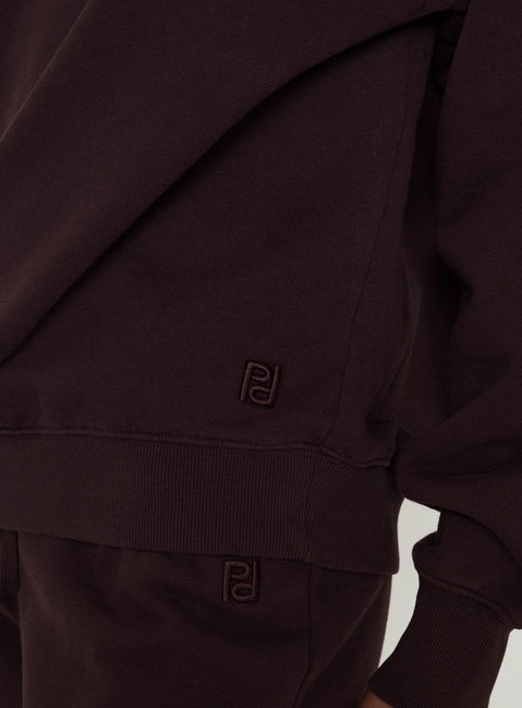 Highlighting the Wellness Off The Shoulder Jumper Brown in women's jumpers with off shoulder detail Princess Polly