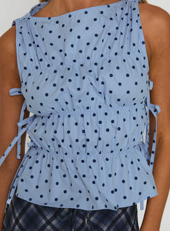 back view of model wearing Princess Polly Endless Summers Tie Side Top Blue Polka Dot Sleeveless Boat Neck 