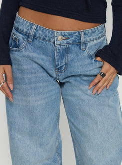 back view of model wearing Princess Polly Ellanor Low Rise Slouch Denim Jean Washed Mid Blue Wash Low Rise Jeans 